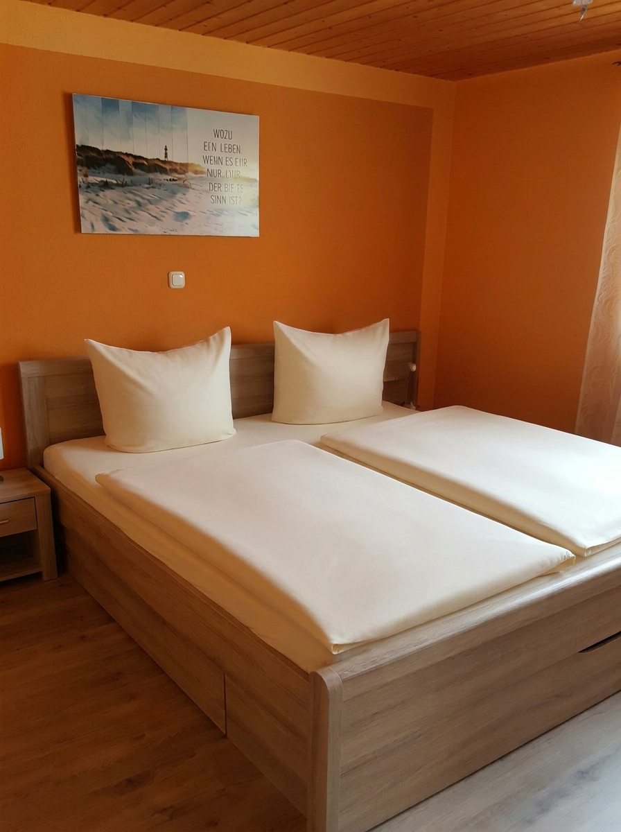 HerzZEIT – Schlafzimmer mit Doppelbett